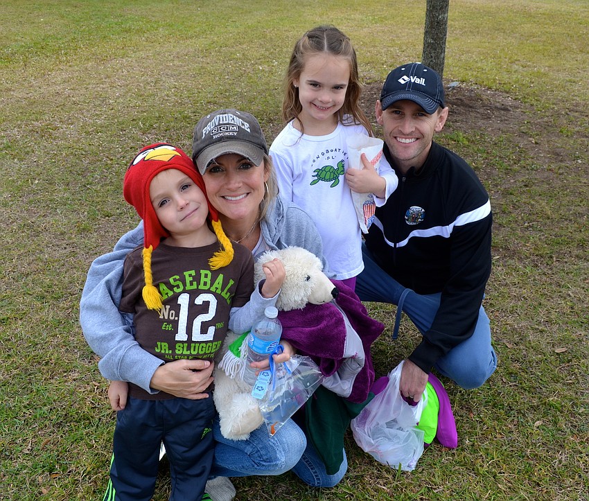 The Higgins family â€” Macklin, 4, Lisa, Callie,7, and Stephen.