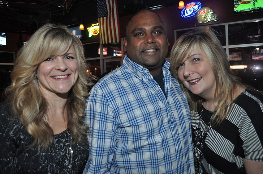 Jackie Breiner, whose husband, John, owns Edâ€™s Tavern, with Joey Ramnarine and Carol Chiossi