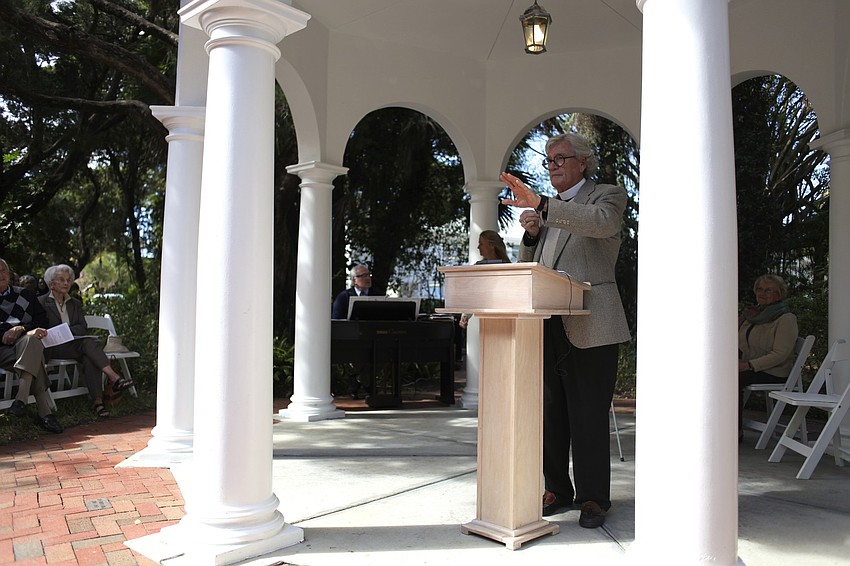 The Rev. Vincent Carroll leads attendees in the dedication.