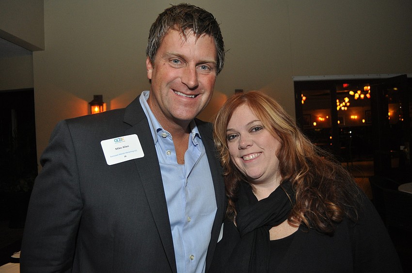 Mike Allen of Suncoast Metals with Miriam Carpenter of Key Glass