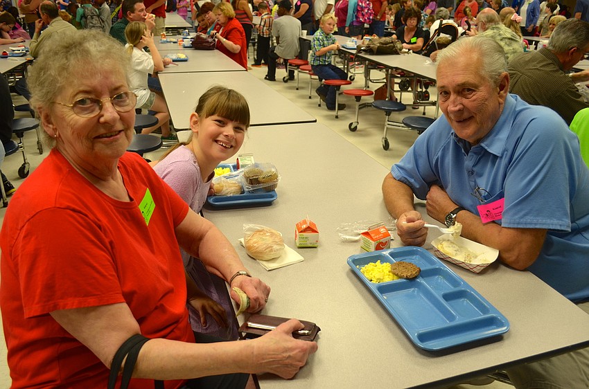 Barbara Aungst sits with her granddaughter Danielle, 8, and her husband Larry.