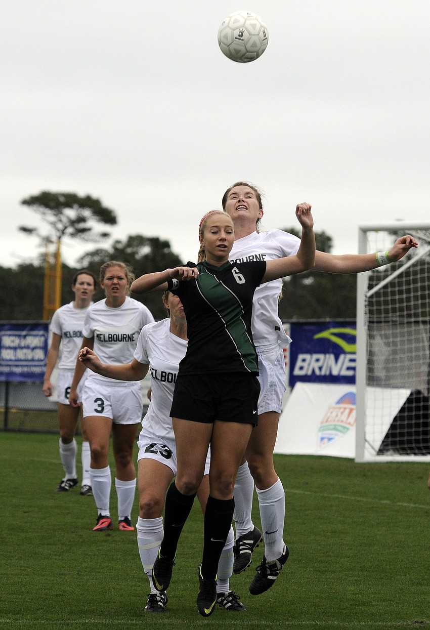 Lakewood Ranch forward Delaney Riggins goes up for the ball early in the first half.