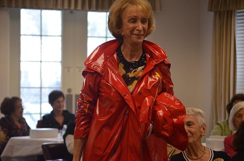 Bert Minot models a designer raincoat.