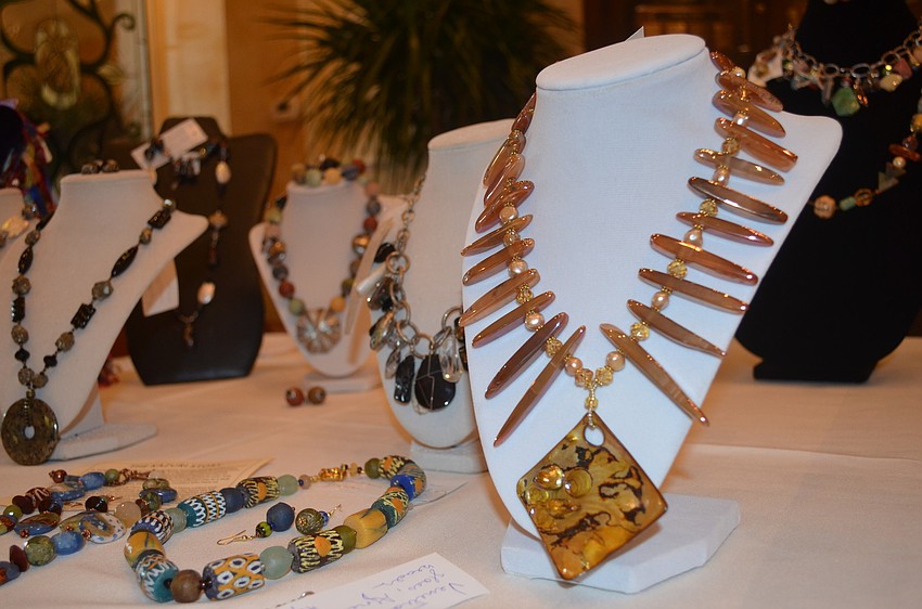Fashion show attendees had the option to purchase necklaces and purses before the event.