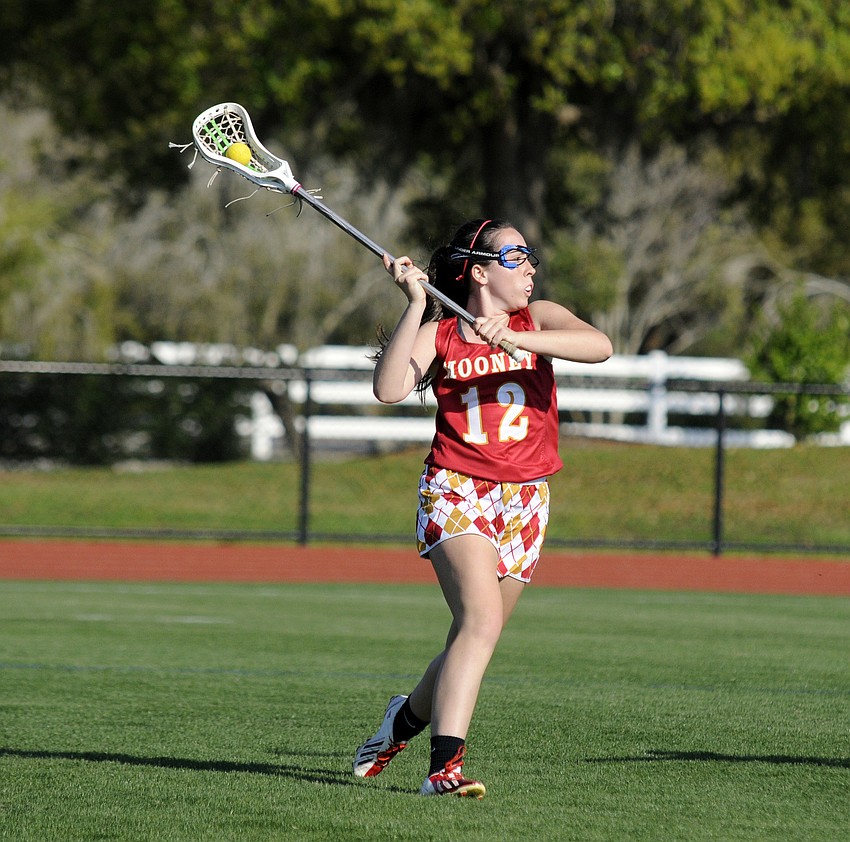 Cardinal Mooney sophomore Farrah Nelson prepares to pass the ball up to an open teammate.