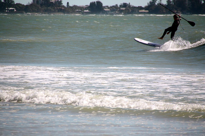 Surfers at Lido Beach.