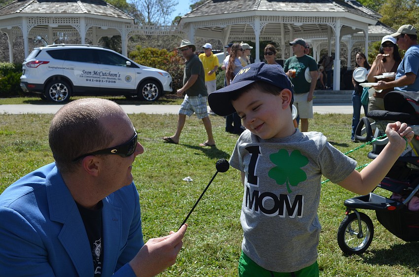 Erin Atkinson welcomes Jackson Brock to the Volunteer firefighterâ€™s tent The Spice is Right.
