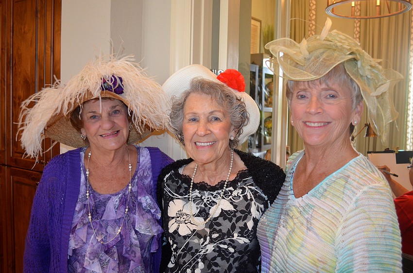 Pat Horner, Esther Poznanski and Jeanine Pitrone show off their favorite hats.