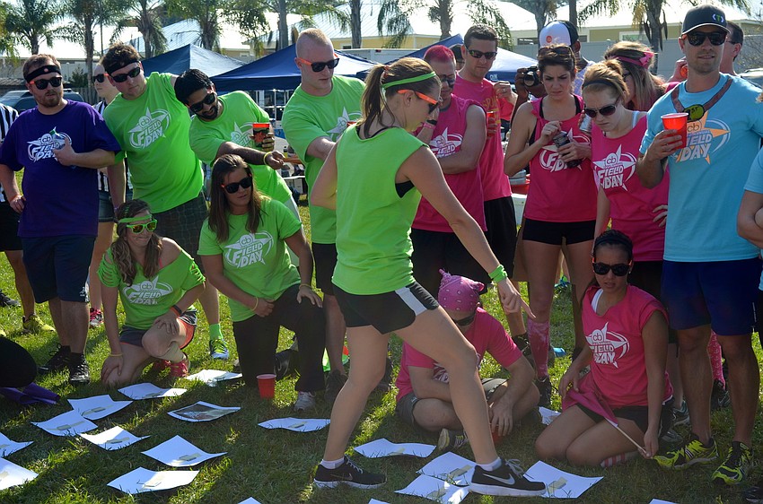 The green team joins forces during a memory game.