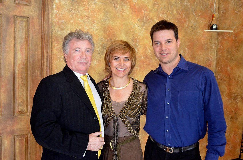 Dancin on the Suncoast owners Patrick and Cyntia Johnson, with Jonathan Roberts.