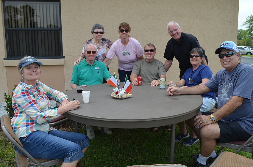 Charlene Marot, Kay and Tom McMullen, Ruth Kolarsick, Dan and Kathi McMullen, Father Fred Tillotson and Rick Marot