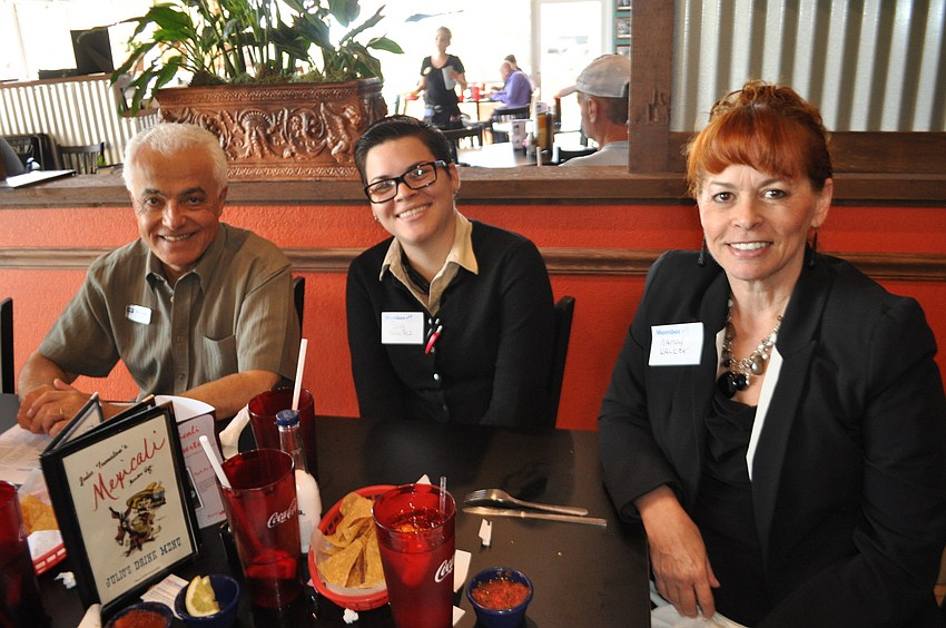 Mo Guimei, of Coldwell Banker, with Sivy Garcia, of Metro PCS, and Nancy Walker, of First Data