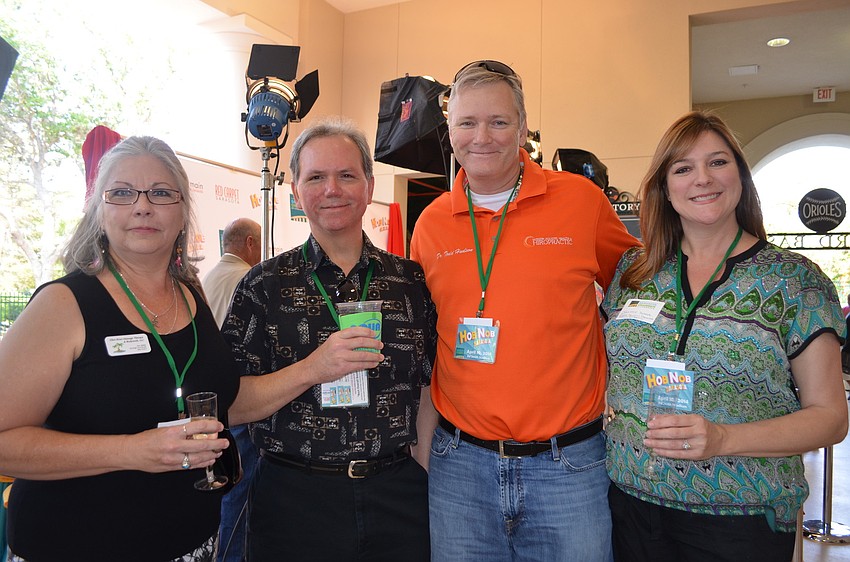 Ellen and Marc Brian with Todd and Jennifer Hudson