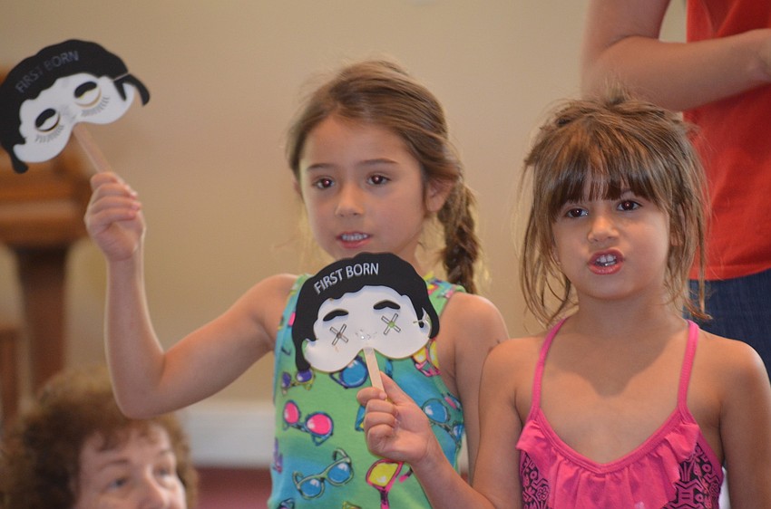 Marli Engel and Reese Stroud sing.