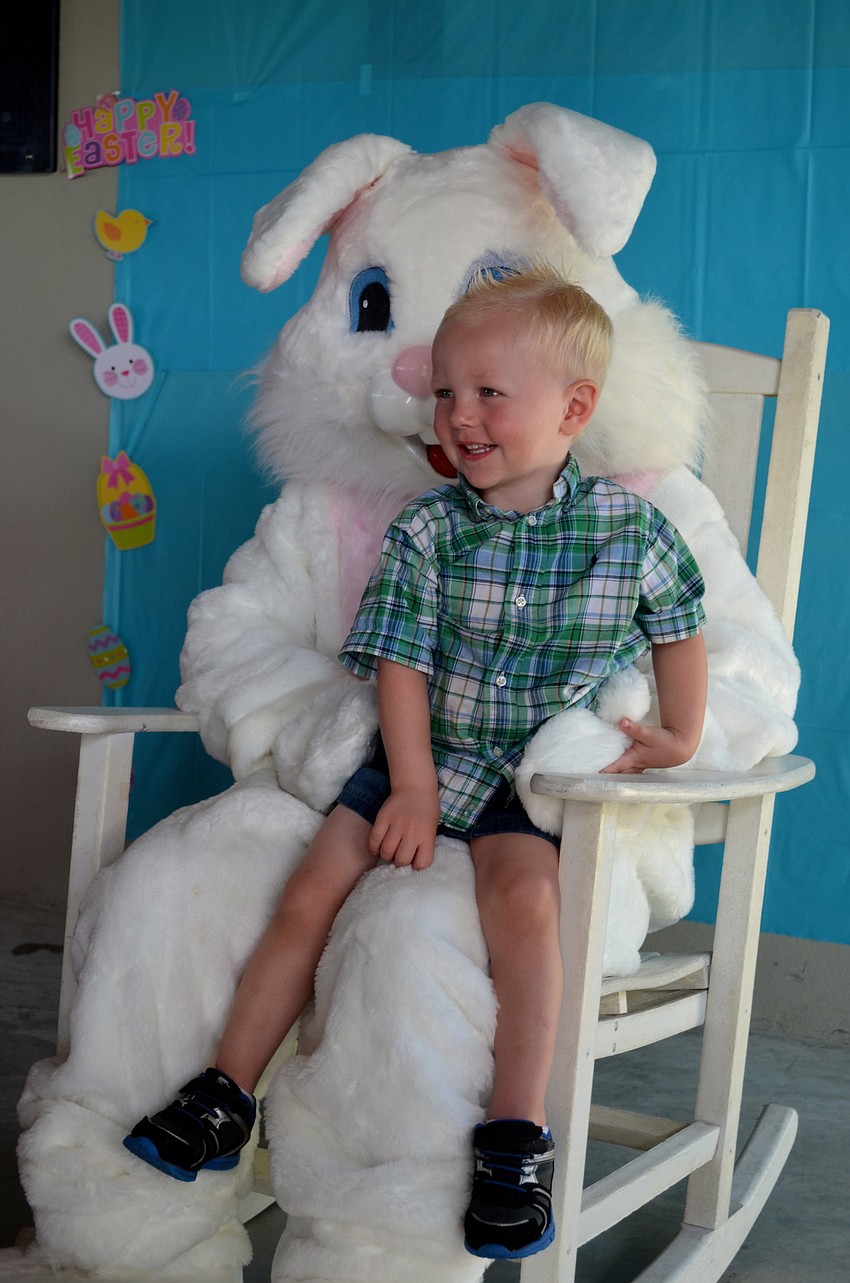 Two-year-old Cason Dooley spends time with a friend.
