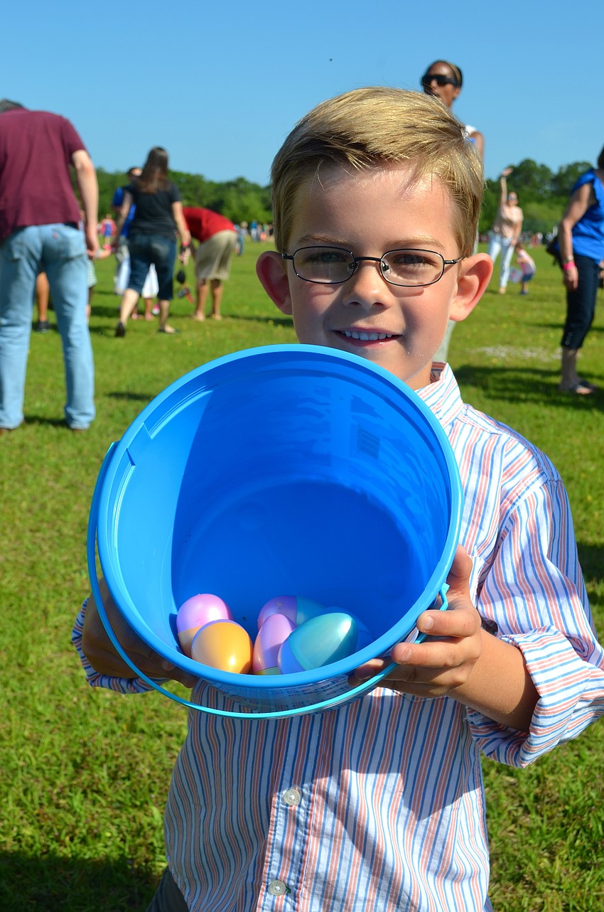 After finding multiple Easter eggs, Trevor Kovatch gave most of his candy to his younger sister.