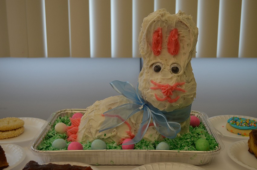 Dessert was a bunny cake and cupcakes.