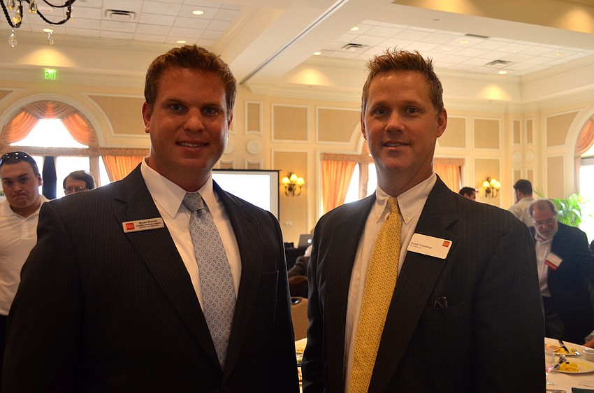 Wells Fargo representatives Ryan Harris and Frank Cummings get their fill of bacon and eggs.