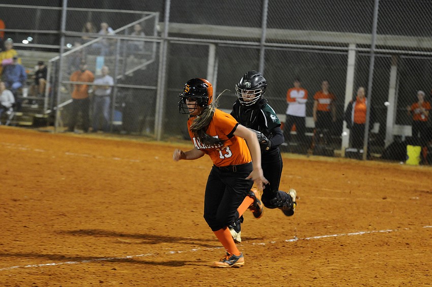 Lakewood Ranch catcher Talli Sharp catches Sarasotaâ€™s Hannah Roberson in a rundown in the fourth inning.