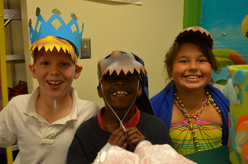Carter Edwards, Jordan Dix and Alexa Bravo joke around before they perform.