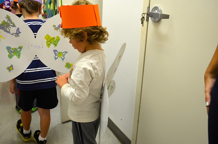 Hunter Montague sports a butterfly outfit he decorated.