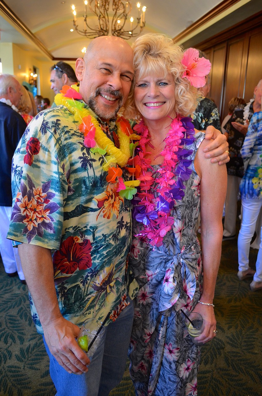 Doug and Diana Rothauser sport tropical clothing.