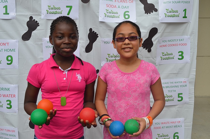 Nadia Fianko and Maria Ledesma at the Carbon Footprint Game.