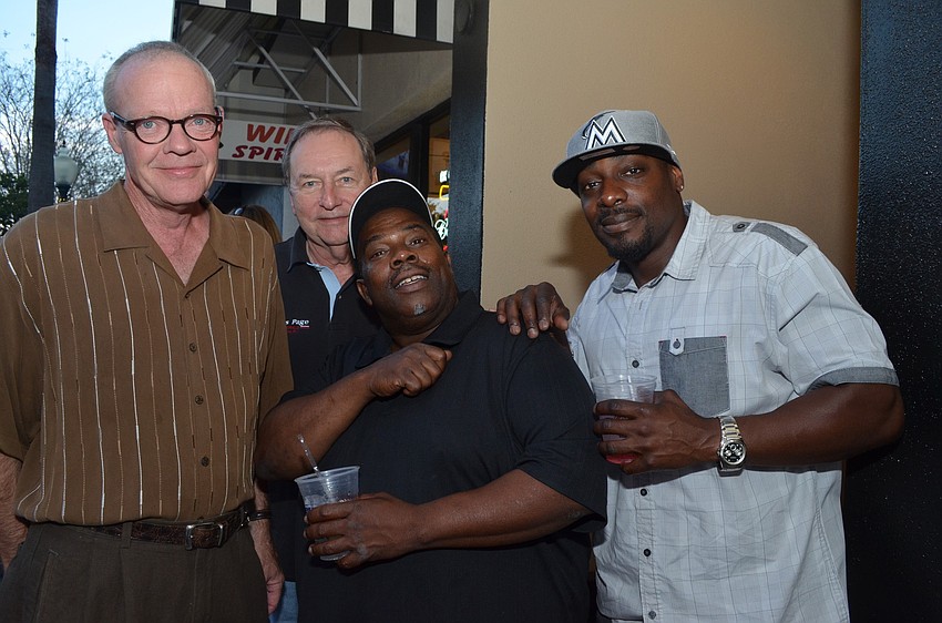 Bob Richards mingles with long time customers Don Price, Dwayne Randell and TJ Jones.