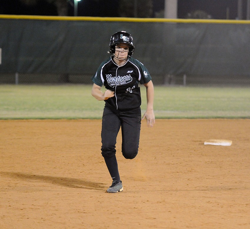 Lakewood Ranch sophomore Talli Sharp heads for third base.