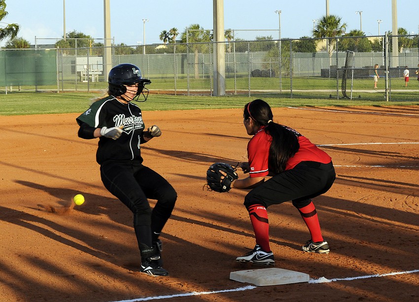 Lakewood Ranch senior Jenn Trotter arrives safely into third base after an errant throw.