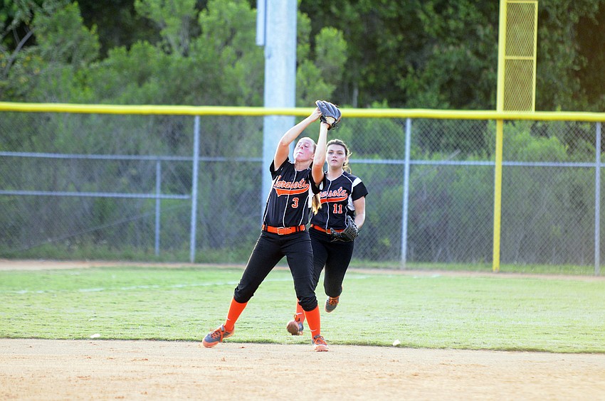 Sophomore shortstop Halie Roberson catches a pop up in the bottom of the second inning.