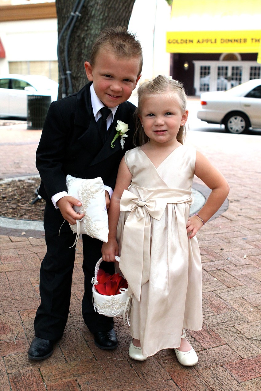 Charlie, 4, and Madelyn, 3, Forbes were the ring bearer and flower girl.
