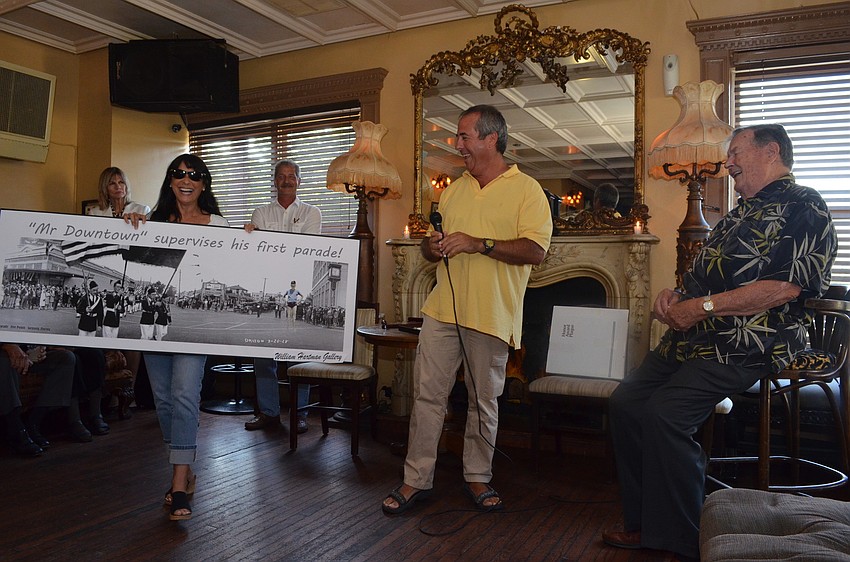 Barbara Strauss put a photo of Paul Thorpe age 12 onto a photograph from a 1928 Sarasota Parade and joked that he really was at the first Sarasota parade. Paul Thorpe organizes the Sarasota holiday parade every year.