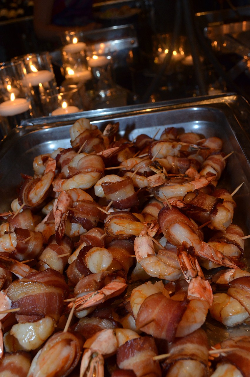 Michaelâ€™s On East served shrimp wrapped in bacon.