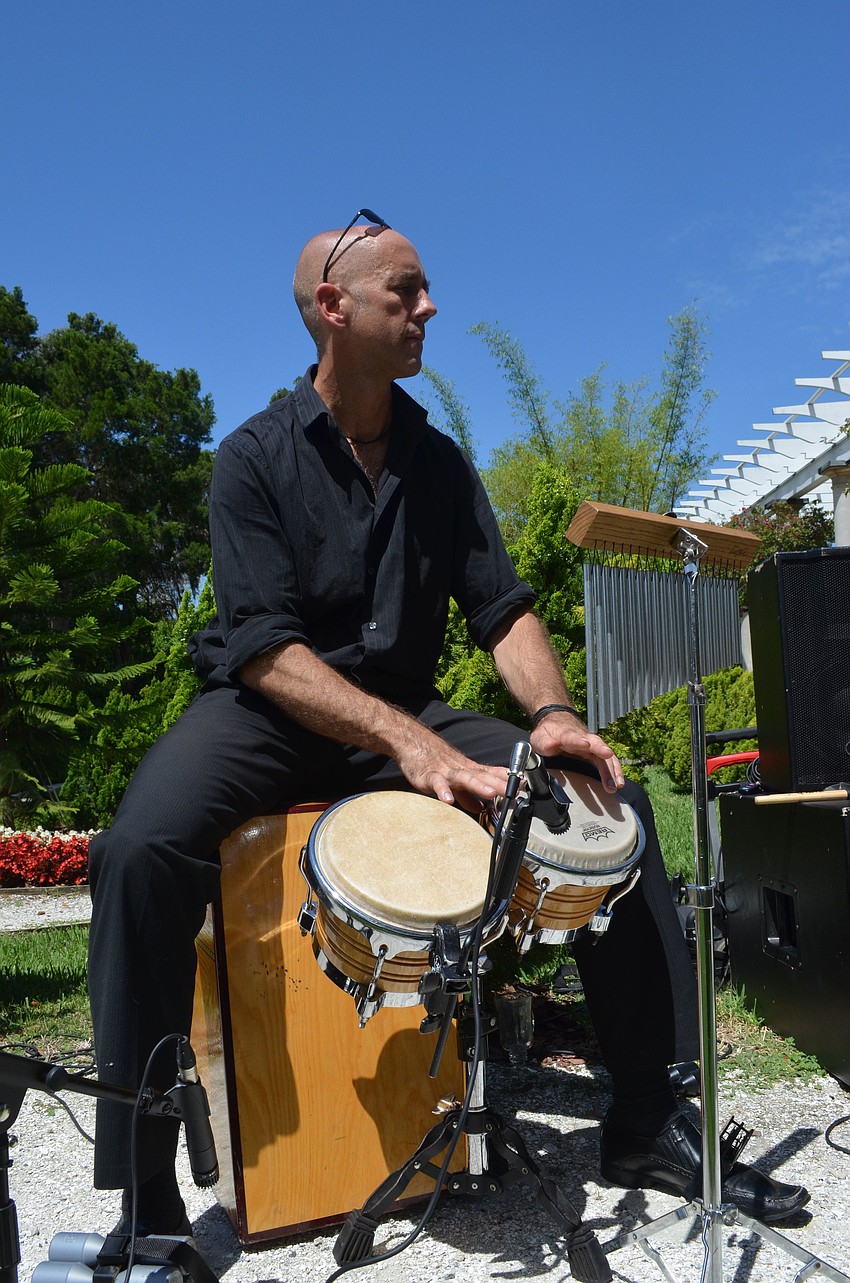 Max Kelley entertains the crowd with Spanish inspired tunes.