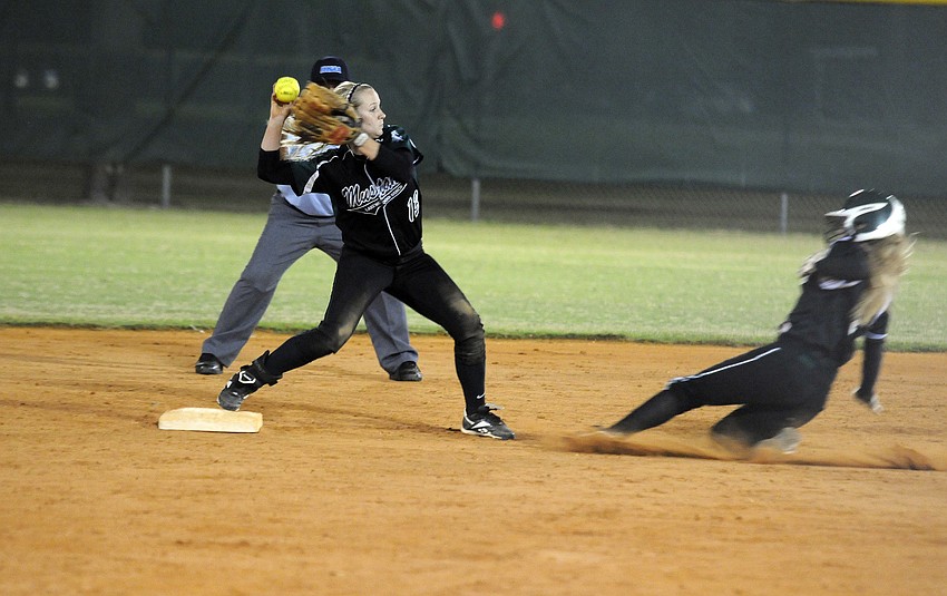 Lakewood Ranch second baseman Jenn Trotter tags second base before attempting to turn a double play.