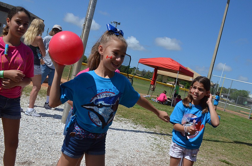 Lindsay Farb gets ready to hit the bowling ball pins.