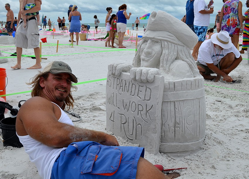 Andrew Dailey works on his winning sculpture.