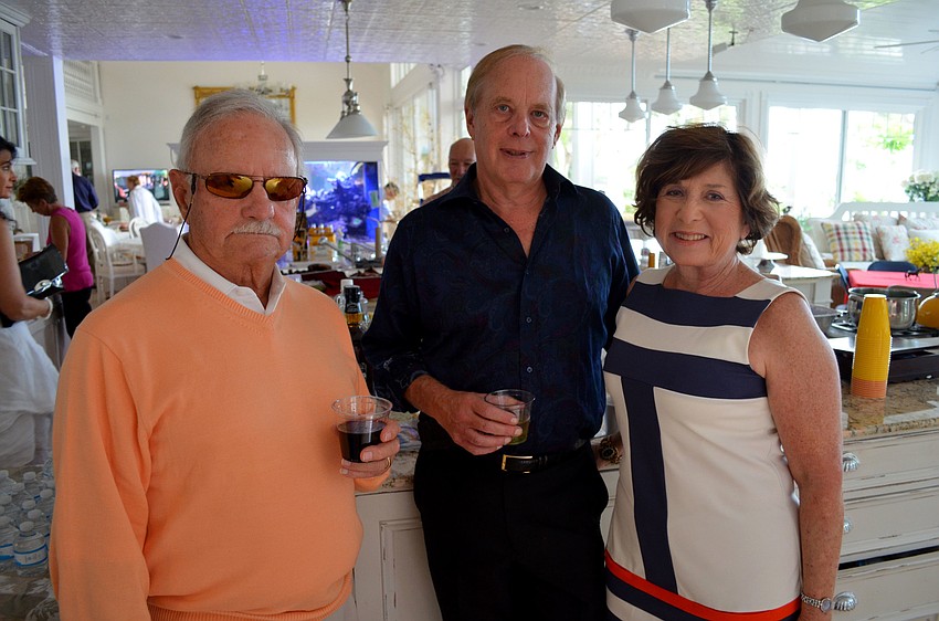 Ned Gilleland with Art and Gail Howard