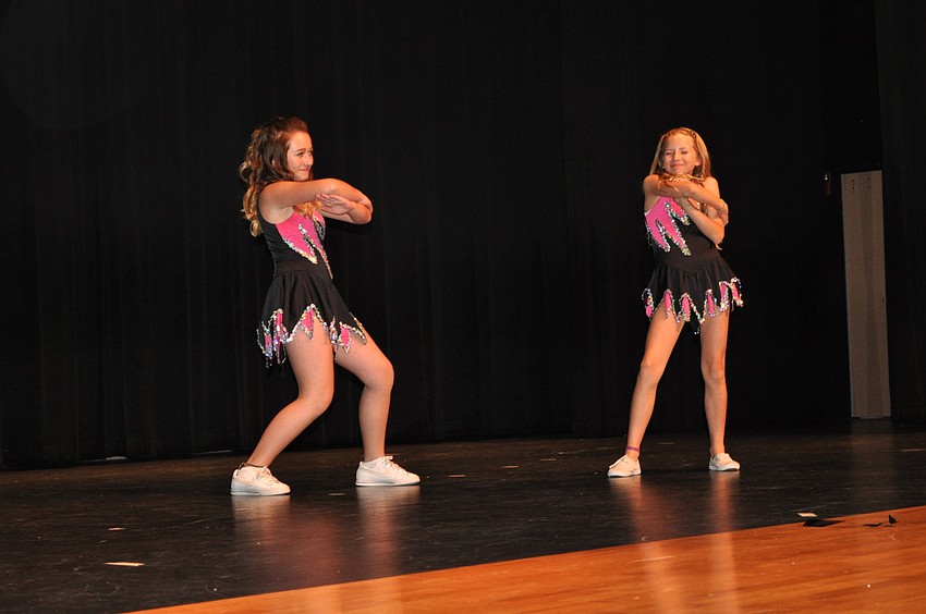 Fifth graders Haley Walker and Zoie Hochstetler of Braden Elementary School moved to â€œCome and Get it,â€ a routine they created themselves.
