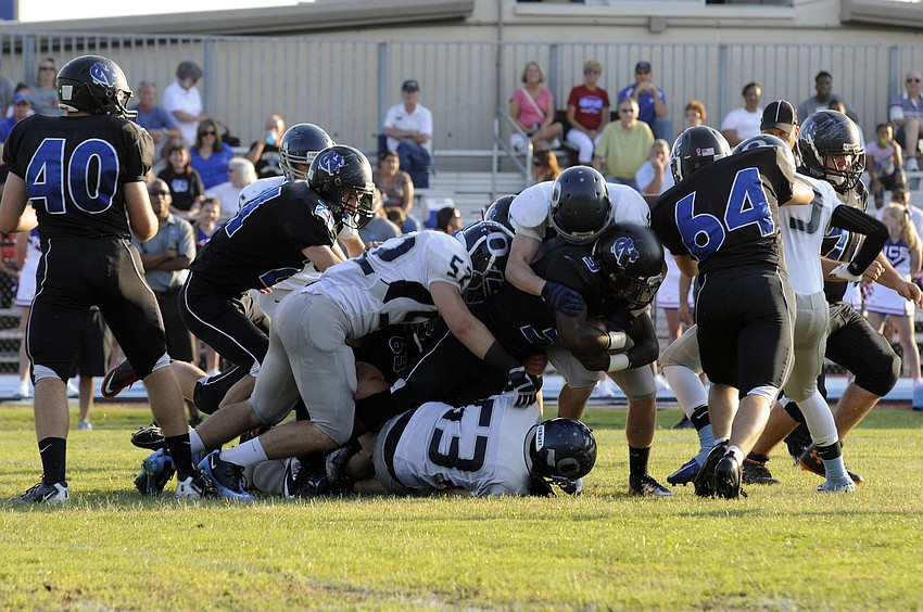 The ODA defense makes a tackle during Northside Christianâ€™s opening possession.