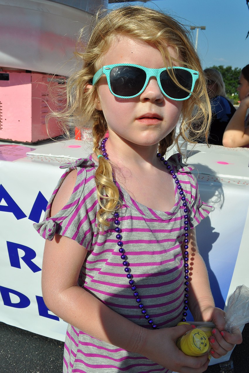 Sienna McHugh, 4, manned a game for young children.