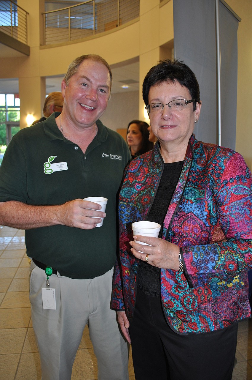 Tom Cofer, of Grow Financial, and Linda de Mello, of USF Sarasota-Manatee