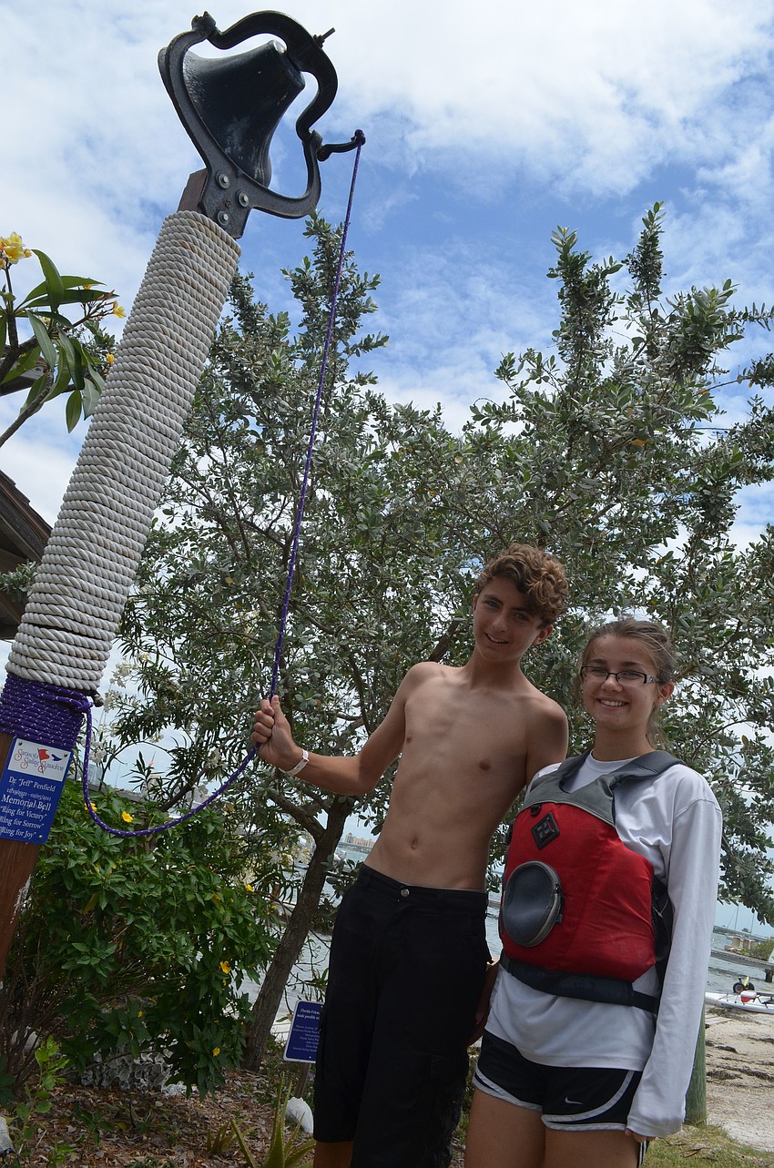 Trevor Stone rings the bell at the end of the race. He took his girlfriend Elly Walton out sailing for the first time.