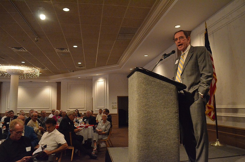 Retired Lt. Gen. of the U.S. Army and Board Chair at Sarasota Military Academy Howard Crowell Jr. calls Headmaster Daniel Kennedy up to the podium to accept his award.