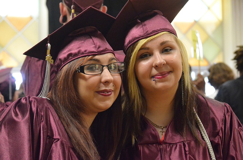 Sisters Kayla and Alyssa Wolnik were excited to accept their diplomas together.