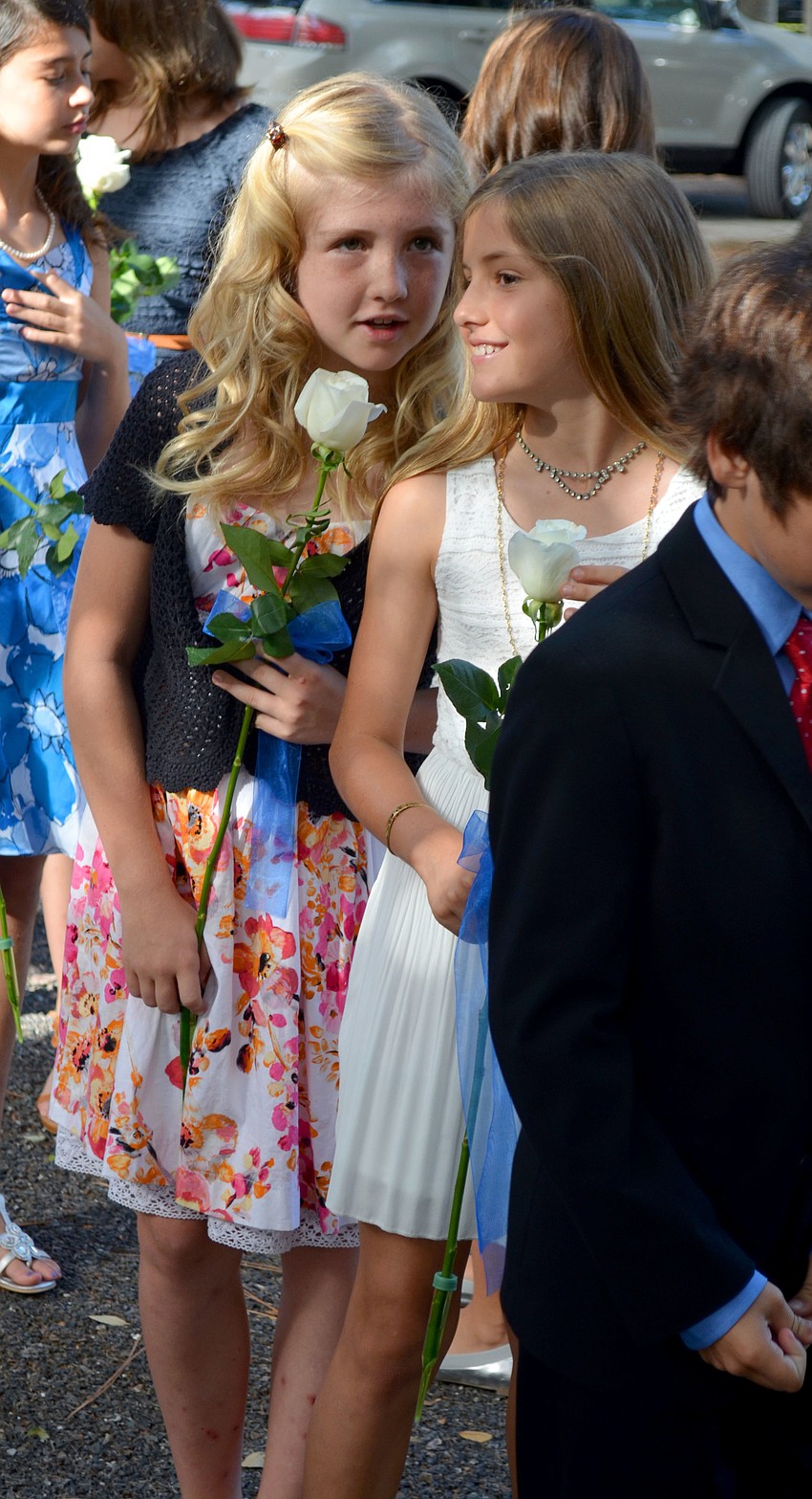 Ellie and Hayley chat before entering Siesta Key Chapel.