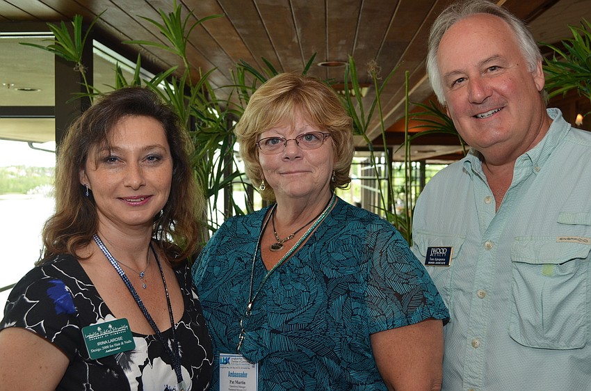 Irina LaRose of Design 2000 for Hair and Nails, Pat Martin of Pampered Movers and Tom Aposporos of J Wood Realty