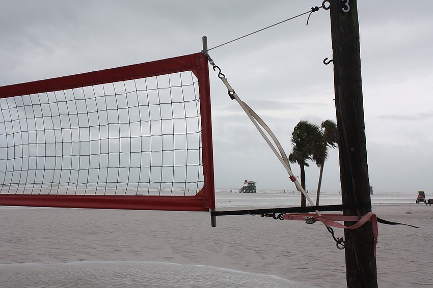 High tide and the storm surge from Tropical Storm Andrea left the volleyball courts on Siesta Key public beach flooded and deserted.