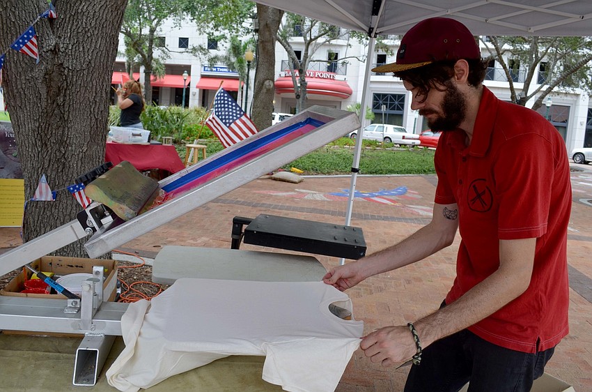 Greg Ferris screen prints shirts.